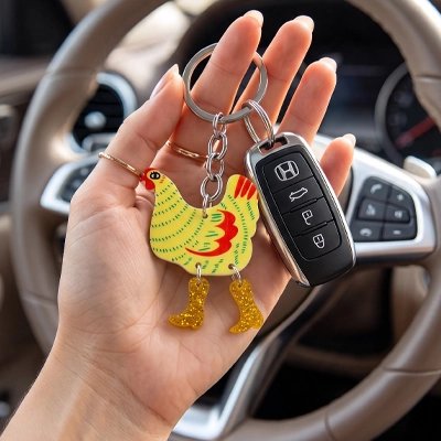Porte clés pour voiture en forme de poule stylisée 