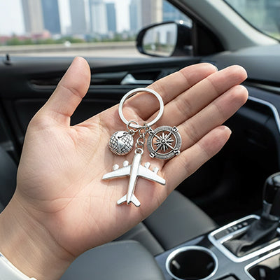 Porte clef avion terre design classique 